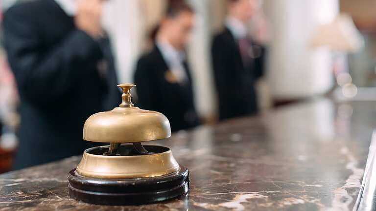 A bell at a hotel reception