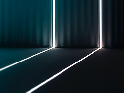 white and green light in a dark room