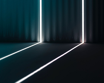 white and green light in a dark room