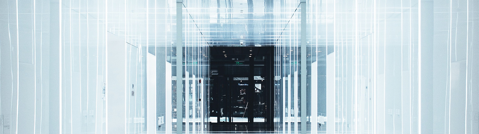 a white hallway with lights