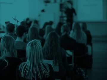 students learning in a classroom