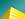 a yellow building with blue sky