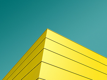 a yellow building with blue sky