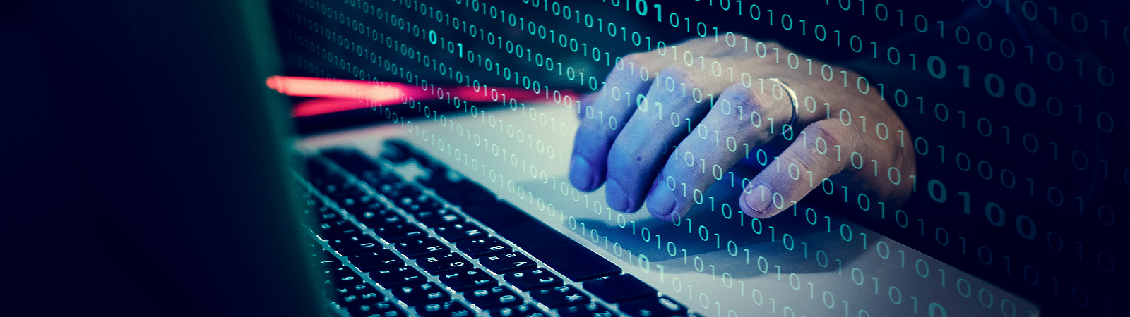 a person typing on a laptop