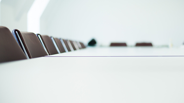 a row of chairs in a room