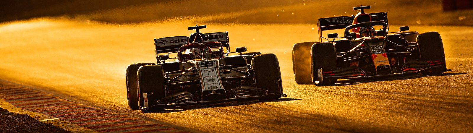 two F1 cars racing