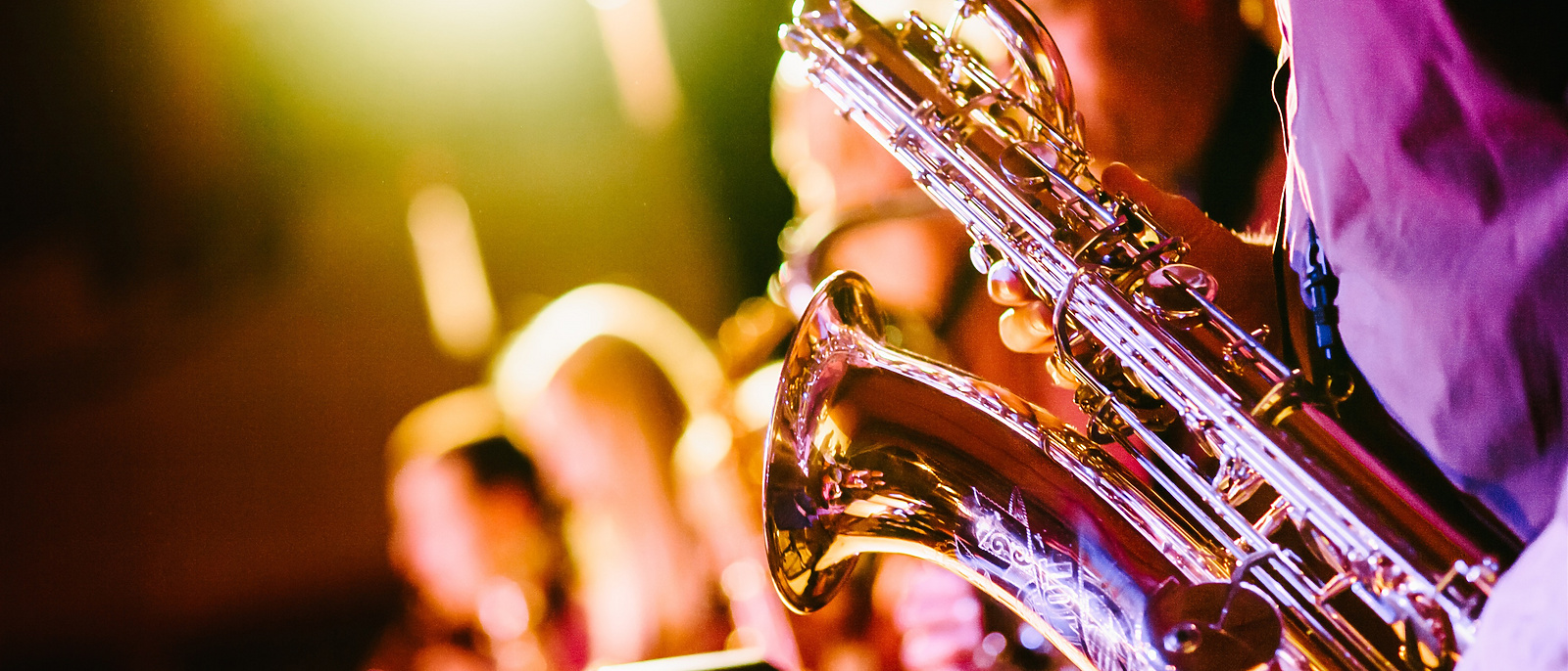 A saxophonist in a live gig setting