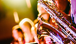 A saxophonist in a live gig setting