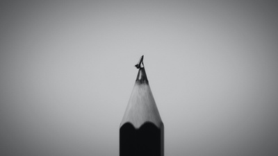 pencil with a rocket carved on top