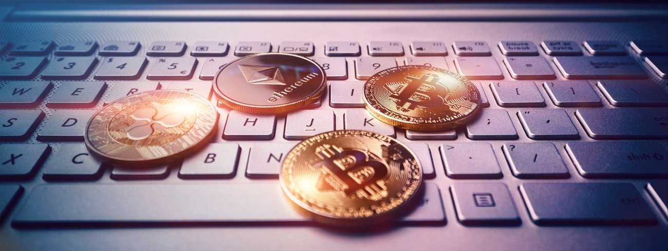 Bitcoins placed over laptop