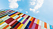 Multi colour panels cladding a building with camera facing skyward