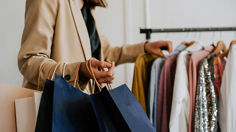 Woman shopping in fashion store