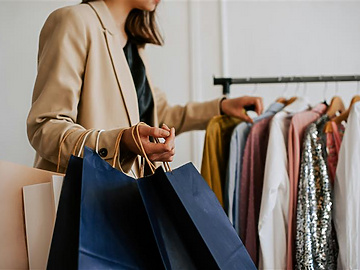Woman shopping in fashion store