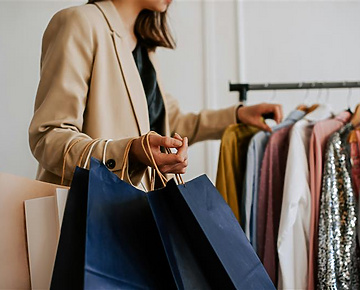 Woman shopping in fashion store