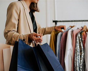 Woman shopping in fashion store