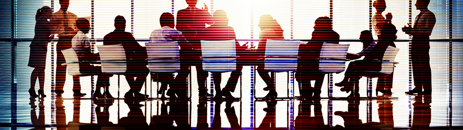 People in a meeting room at work