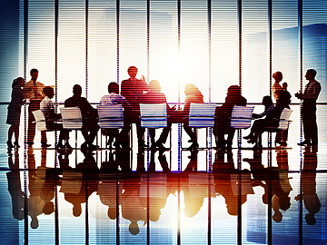 People in a meeting room at work