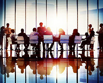 People in a meeting room at work