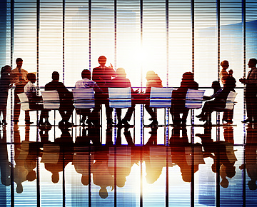 People in a meeting room at work