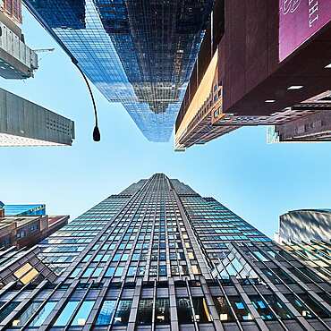 looking up a tall buildings