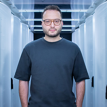 a person standing in a room with white walls