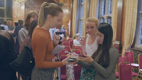 Girls giving and receiving gifts at a celebration