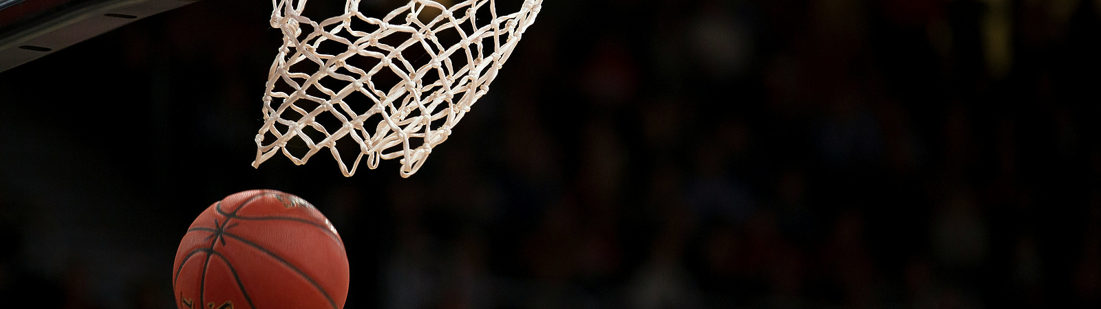 a basketball going into a net