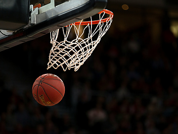 a basketball going into a net