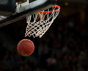a basketball going into a net