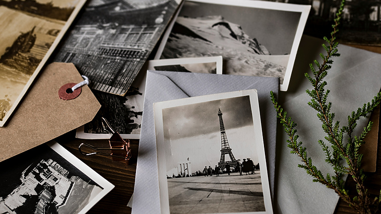 a group of photos and envelopes