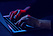 Person's hands typing on laptop
