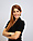 head&sholder image of a woman wearing a black dress