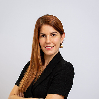 head&sholder image of a woman wearing a black dress