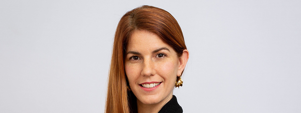 head&sholder image of a woman wearing a black dress