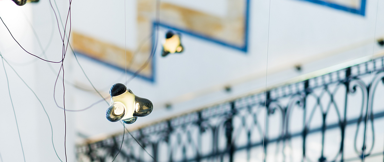 a group of vases with flowers