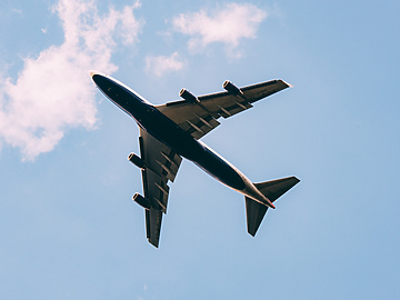 a plane flying in the sky