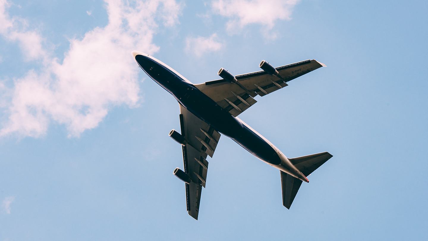 a plane flying in the sky