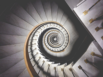 a spiral staircase with a spiral staircase