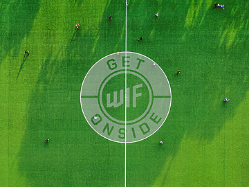 Football pitch with Women in Football logo on it