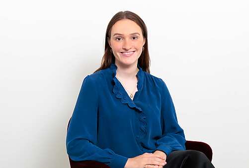 Laura Simmons sitting in a chair