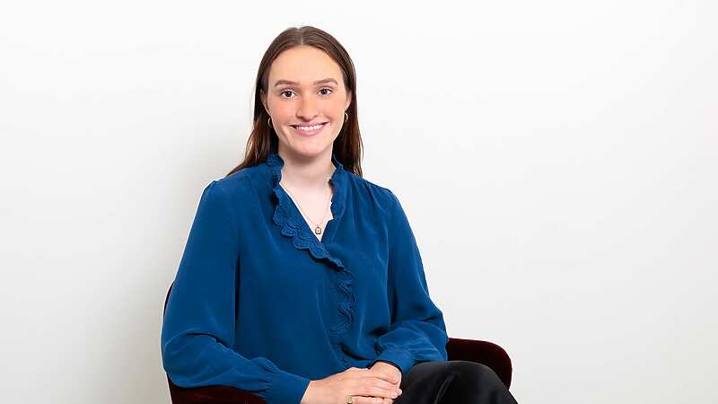Laura Simmons sitting in a chair