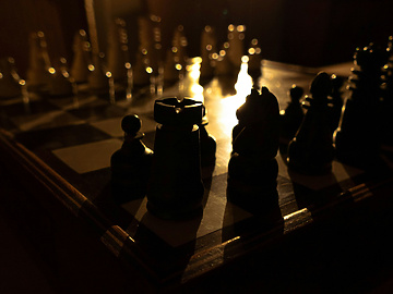 a chess board with chess pieces