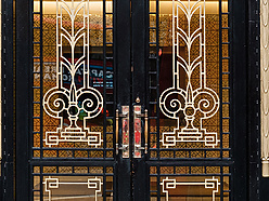 a double doors with ornate designs