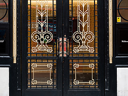 a double doors with ornate designs