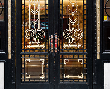 a double doors with ornate designs