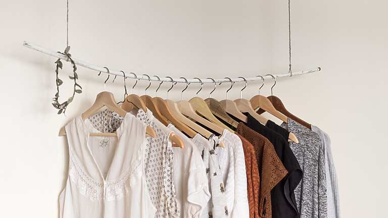 a group of clothes on swingers