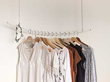 a group of clothes on swingers
