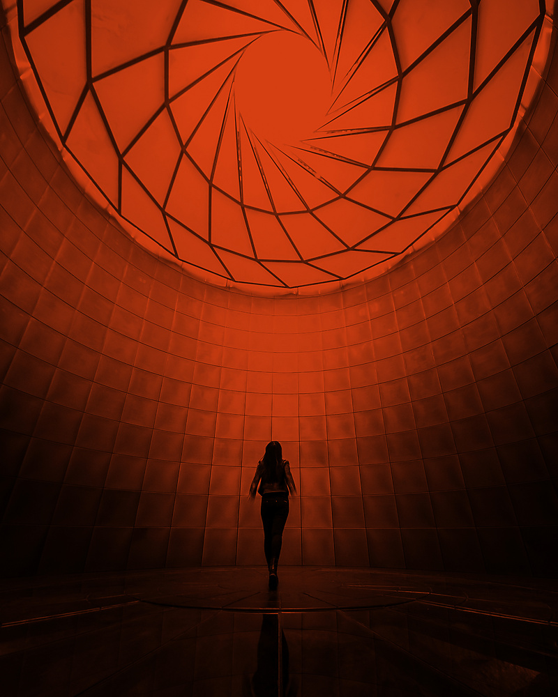 a person walking in a tunnel