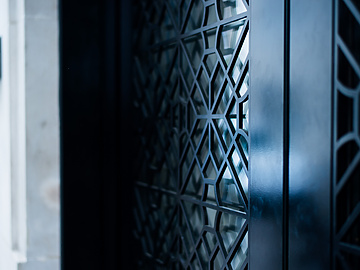 Black designed patterned door in Mishcon de Reya building, abstract picture