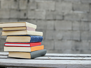 School books on bench